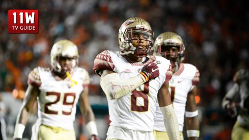 15 November 2014: Florida State University Defensive Back Jalen Ramsey (8) celebrates his interception of a pass from University of Miami Hurricanes Quarterback Brad Kaaya (not shown) in the last seconds of NCAA football game between the Florida State Seminoles and the University of Miami Hurricanes at the Sun Life Stadium in Miami Gardens, Florida.