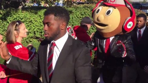 J.T. Barrett and Brutus at the Buckeye Walk