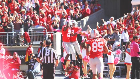Jalin Marshall and Dontre Wilson celebrate a touchdown