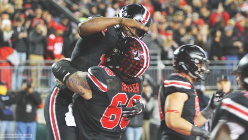 J.T. Barrett and Taylor Decker celebrate in the end zone.