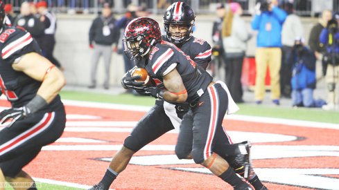 J.T. Barrett and Ezekiel Elliott led the Buckeyes over Penn State, 38-10.