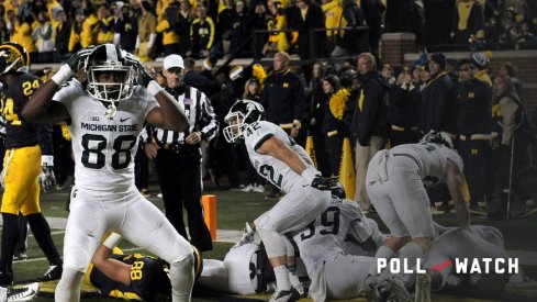 October 17, 2015: Michigan State players celebrate in the end zone after Jalen Watts-Jackson returned a muffed punt 38-yards for the game-winning touchdown while trailing rival Michigan 23-21 with 10-seconds to go in the game. The Spartans won the game 27-21, Saturday at Michigan Stadium. (Photo by Lon Horwedel/Icon Sportswire)