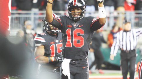 J.T. Barrett celebrates a touchdown.