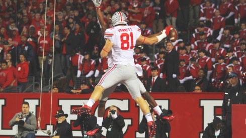 Nick Vannett and Michael Thomas celebrate a touchdown.