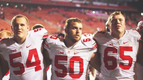 Billy Price, Jacoby Boren, and Pat Elflein sing Carmen Ohio after beating Rutgers.