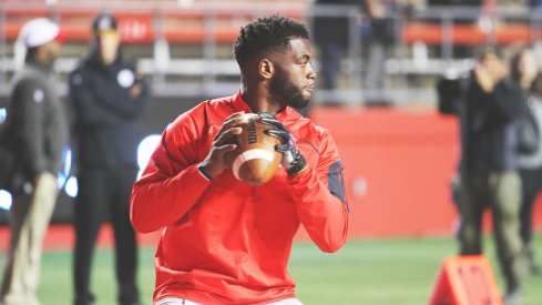 J.T. Barrett warms up vs. Rutgers.