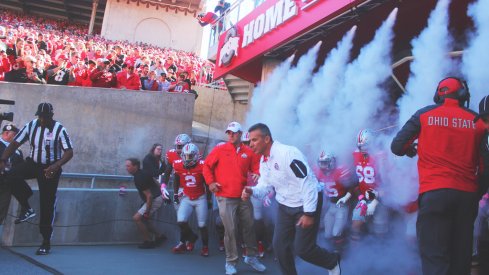 Urban Meyer, Ohio State take the field.