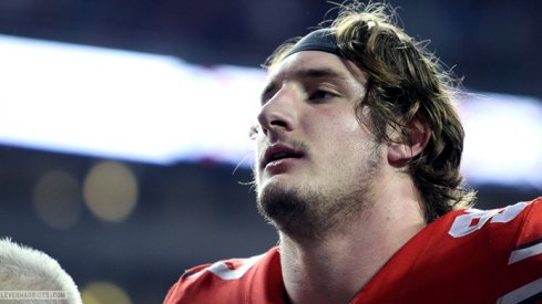 Joey Bosa sings Carmen Ohio after beating Minnesota.