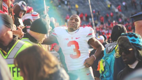 Michael Thomas shakes hands with the fans after Ohio State's 42-13 rout of Michigan. 