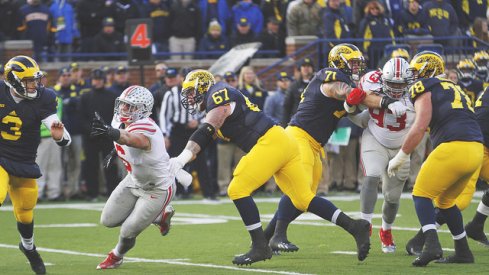 Sam Hubbard hunts down Wilton Speight as Kyle Kalis says "Oh no not again."