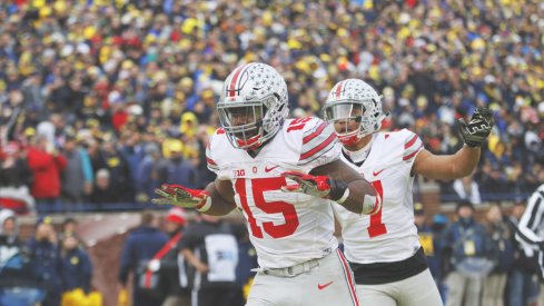 Ezekiel Elliott celebrates a touchdown run against Michigan. 