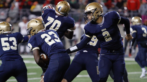 Danny Clark hands off to Todd Sibley in the state championship game.