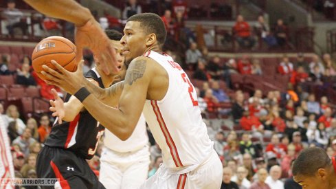 Marc Loving drives for two against VMI. 