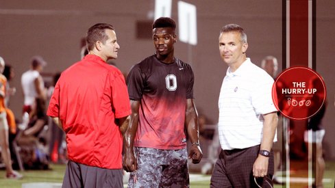 Tim Beck, Tristen Wallace and Urban Meyer at Ohio State in June.