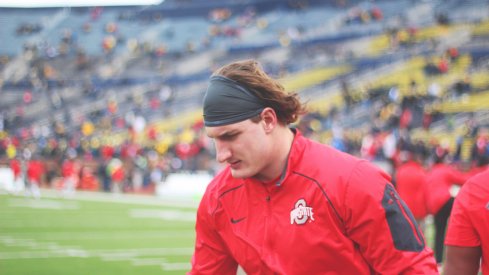 Joey Bosa warms up for the Michigan game. 