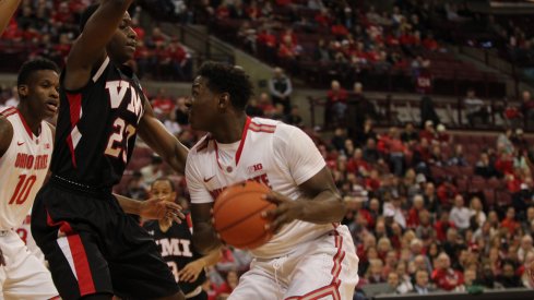Jae'Sean Tate drives inside against VMI.