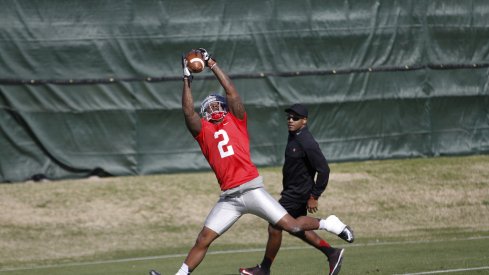 Dontre Wilson hauls in a pass Tuesday at Ohio State's Fiesta Bowl practice.