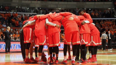 Ohio State huddles prior to beating Illinois. 