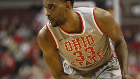Keita Bates-Diop sizes up a Michigan defender.
