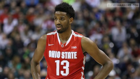 Ohio State guard JaQuan Lyles has no answers for Michigan State's assault.