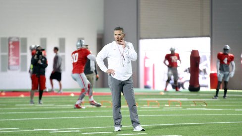 Urban Meyer patrols a recent spring practice.