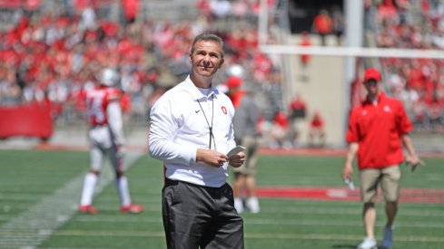 Urban Meyer met reporters briefly Wednesday at the WHAC.