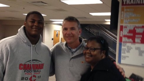 Urban Meyer with Trevor Trout and his mother.