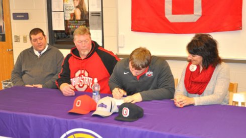 Gavin Cupp inks his letter to Ohio State. 