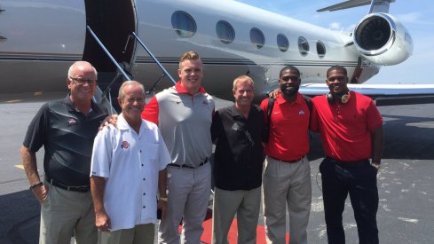 Ohio State captains and old men board flight to Chicago en route to Chicago.