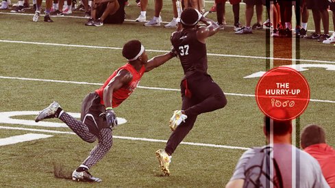 Tyjon Lindsey, right, attempts to haul in a pass at Friday Night Lights.