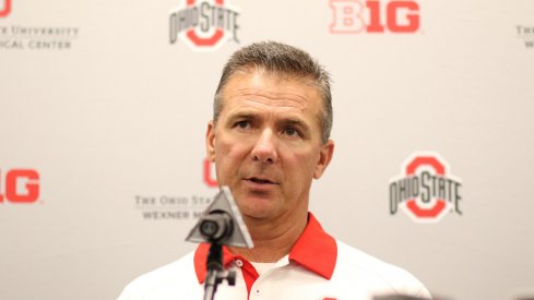 Urban Meyer addresses the media.