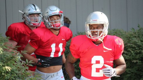 Dontre Wilson and Austin Mack take the practice field for Ohio State. 