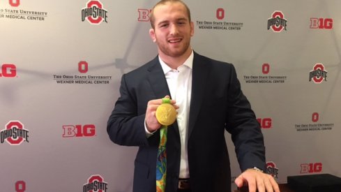 Kyle Snyder shows off his Olympic Hardware.