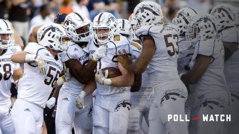 Sep 17, 2016; Champaign, IL, USA; The Western Michigan Broncos defense celebrates after the interception by Western Michigan Broncos linebacker Robert Spillane (10) during the fourth quarter at Memorial Stadium. Western Michigan beat Illinois 34 to 10. Mandatory Credit: Mike Granse-USA TODAY Sports