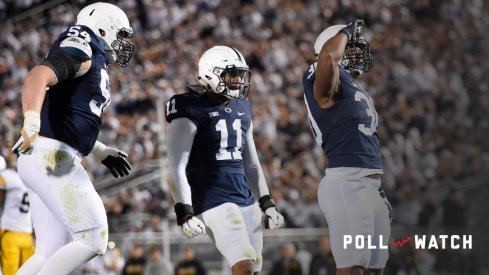 Nov 5, 2016; University Park, PA, USA; Penn State Nittany Lions defensive tackle Kevin Givens (30) reacts with teammates linebacker Brandon Bell (11) and defensive tackle Robert Windsor (54) following his sack of Iowa Hawkeyes quarterback C.J. Beathard (not pictured) during the third quarter at Beaver Stadium. Penn State defeated Iowa 41-14. Mandatory Credit: Rich Barnes-USA TODAY Sports