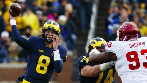 John O'Korn throws a pass against Indiana.