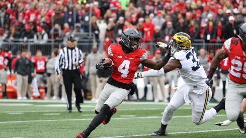 Curtis Samuel runs against Michigan. 