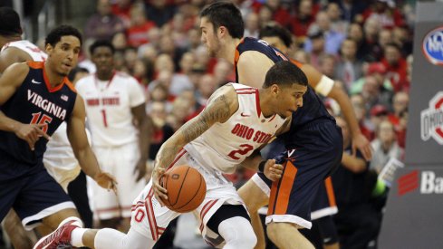 Marc Loving dribbles against Virginia last season. 