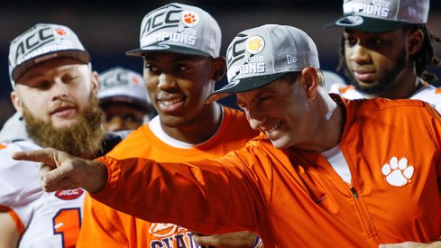 Clemson head coach Dabo Swinney points during the ACC Championship trophy celebration. Logan Bowles - USA TODAY Sports