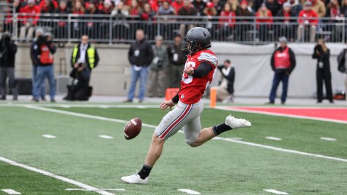 Ohio State's Cameron Johnston makes a punt against Michigan.