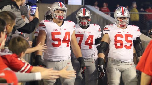 Billy Price, Pat Elflein take the field before Ohio State's game at Wisconsin. 