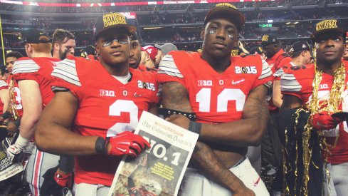 Ohio State's Raekwon McMillan and Jalyn Holmes celebrate the national title in 2014. 