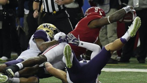 Dec 31, 2016; Atlanta, GA, USA; Alabama Crimson Tide running back Bo Scarbrough (9) reaches for a touchdown against the Washington Huskies during the first quarter in the 2016 CFP semifinal at the Peach Bowl at the Georgia Dome. Mandatory Credit: Dale Zanine-USA TODAY Sports