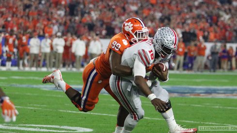 Clemson's Clelin Ferrell brings down Ohio State quarterback J.T. Barrett.