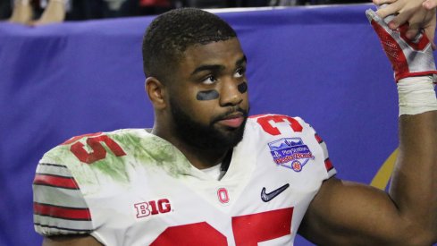 Ohio State LB Chris Worley shakes hands with fans after loss to Clemson. 