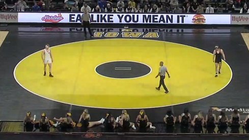 No. 4 Kollin Moore prepares for his match in Iowa City