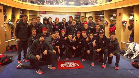 The Ohio State men's ice hockey team in the New York Rangers locker room at Madison Square Garden.