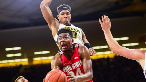 Ohio State's Andre Wesson drives inside against Iowa. 