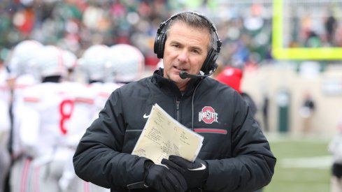 Though it is his offense, Urban Meyer wants his trust his offensive coordinator enough where he can focus on other things as head coach.