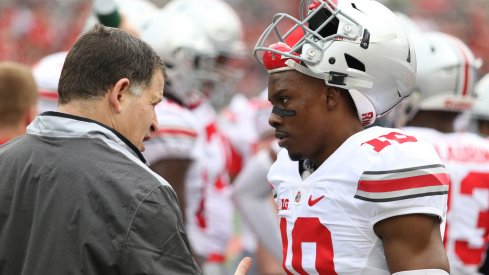 Ohio State safeties coach talks to Kendall Sheffield at the spring game. 